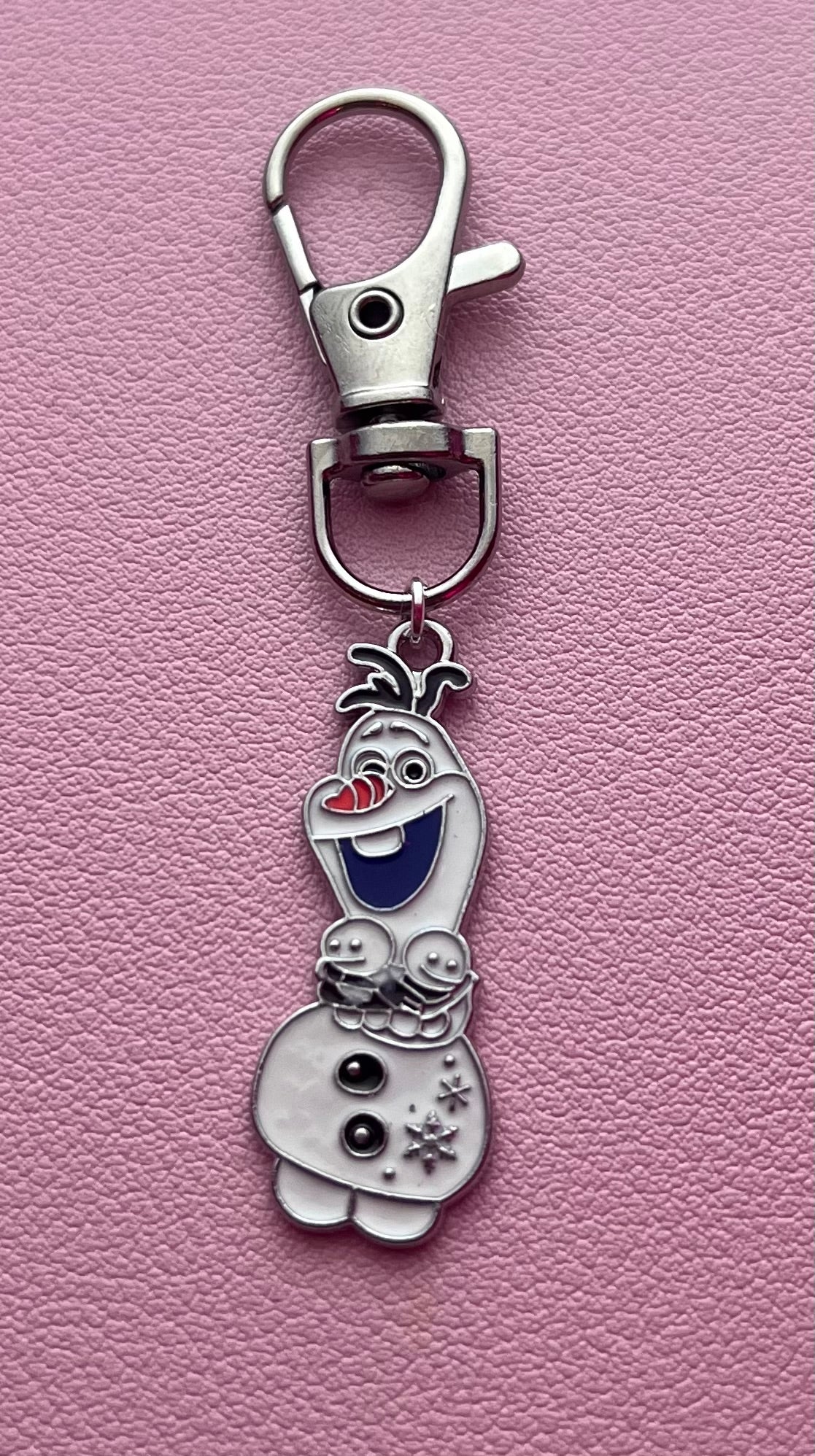 Two snowball Olaf Blingz